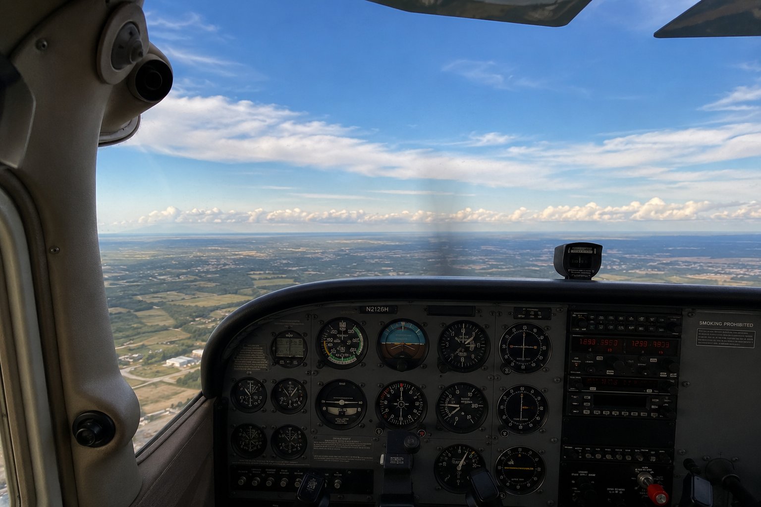 View from inside a Cessna cockpit during a training flight